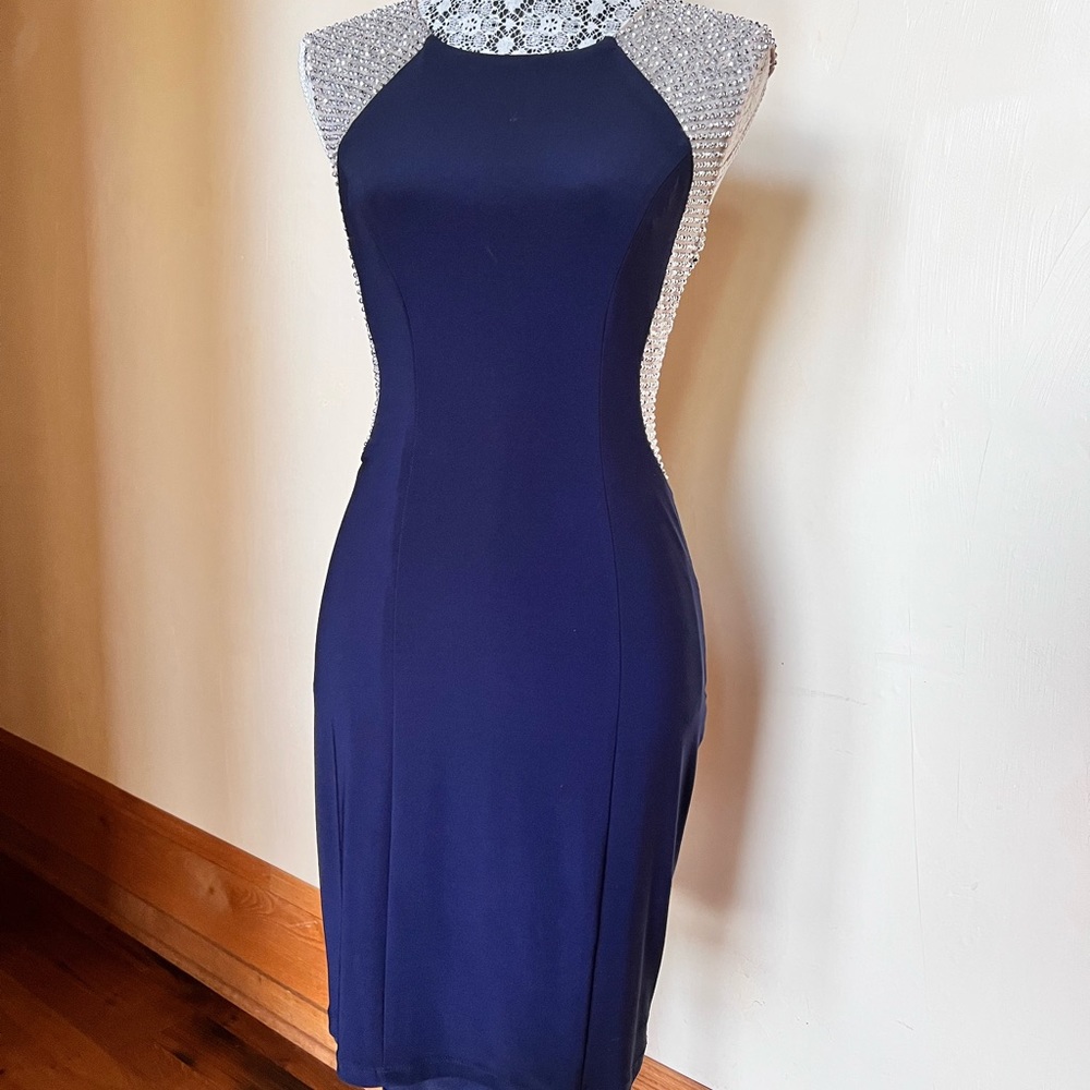 Beautiful blue sparkle dress   Size 4.   Length hits right at the knee.